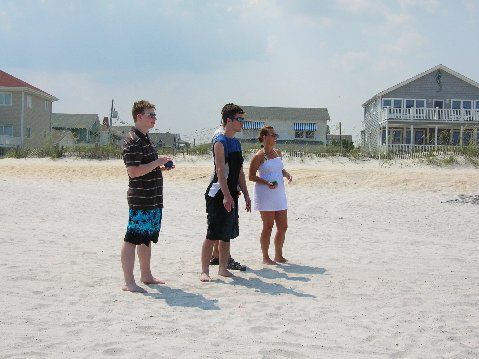 Jared, Kelly, and Michael playing bocce.